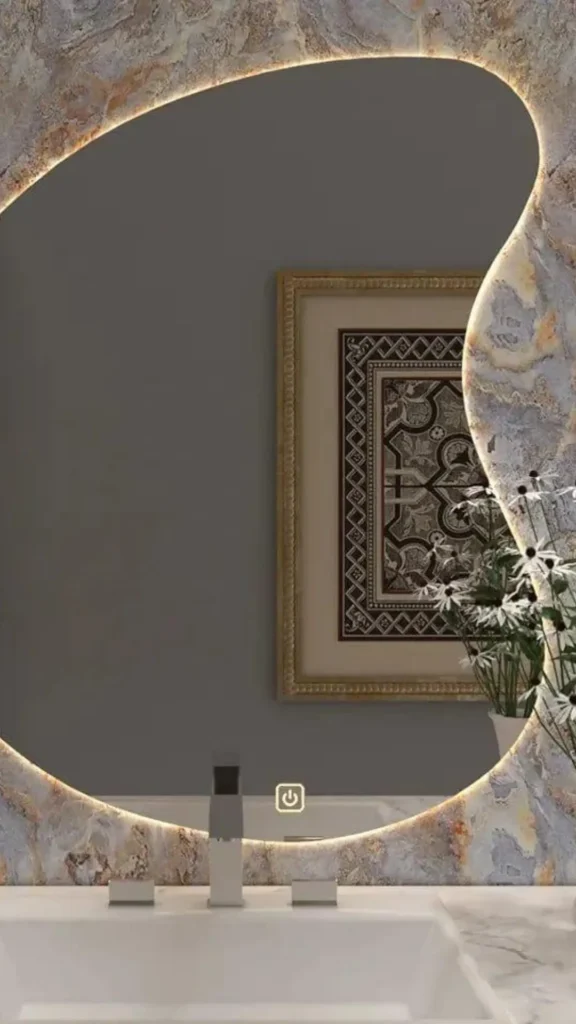 One Large Mirror in an Organic Form Doubles Light and Visual Space