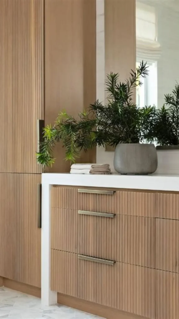 bathroom vanity ideas fluted reeded cabinet detail warm wood beautiful texture 2026
