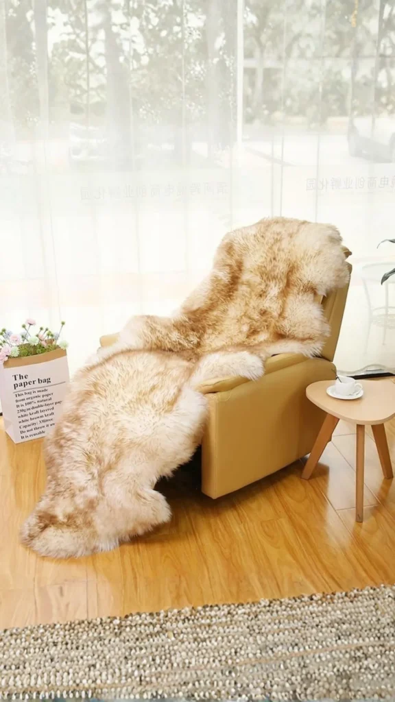scandinavian interior design sheepskin wool textures warm chair 2026