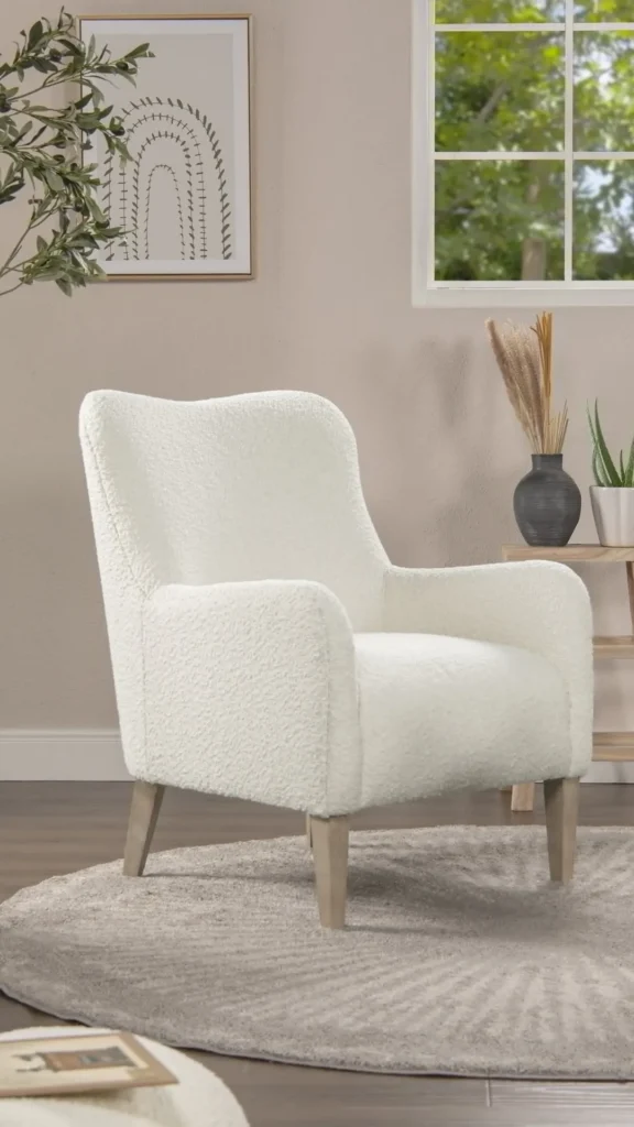 curved accent chair video call background styled home office