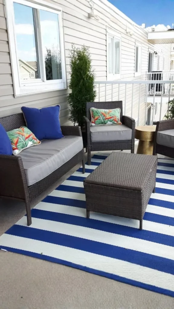 outdoor living space ideas outdoor rug anchoring lounge zone patio terrace warm