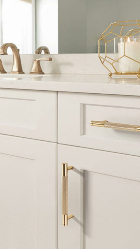 bathroom vanity ideas warm brass drawer pulls wood cabinet 2026