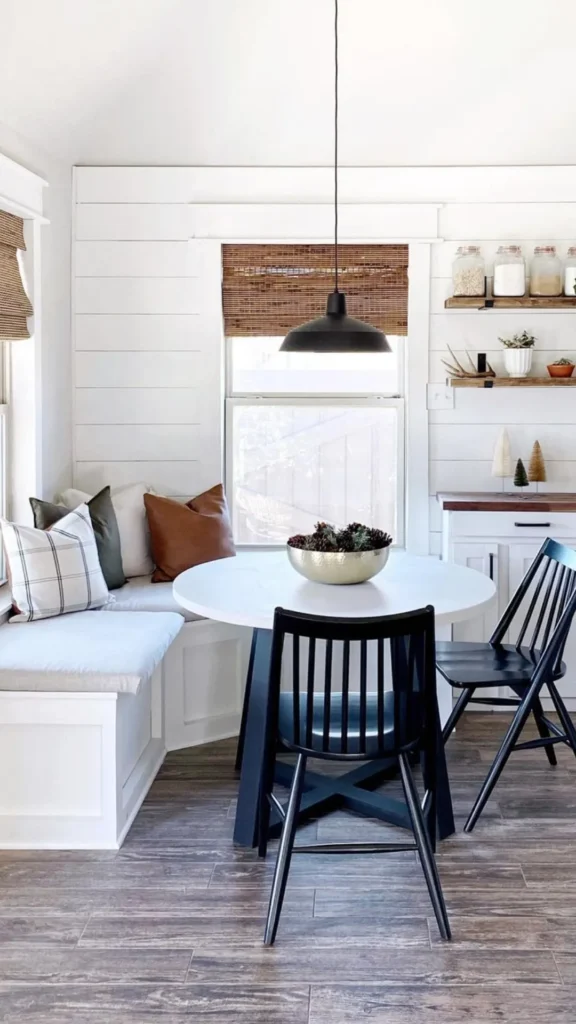 light oak kitchen cabinets breakfast nook built in bench seating round table