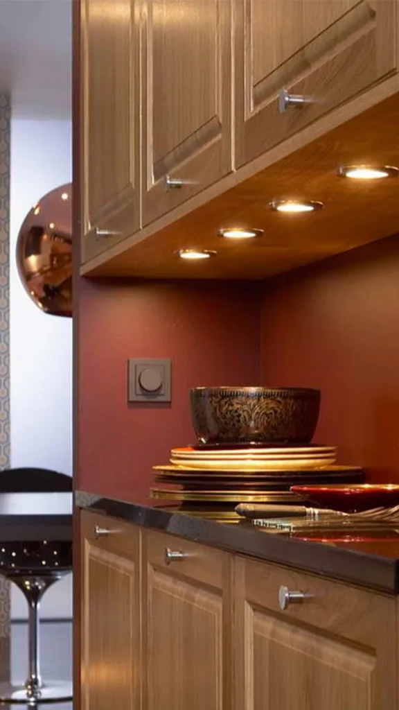 light oak kitchen cabinets under cabinet lighting warm LED grain highlight 2026