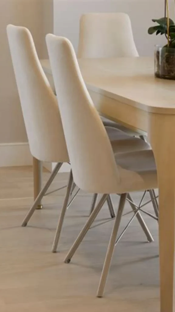 curved dining chair exaggerated high back dramatic tall