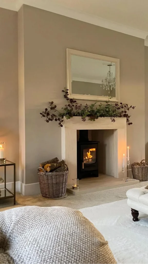 warm earthy paint colors living room warm driftwood grey warm wood furniture cream textiles 2026