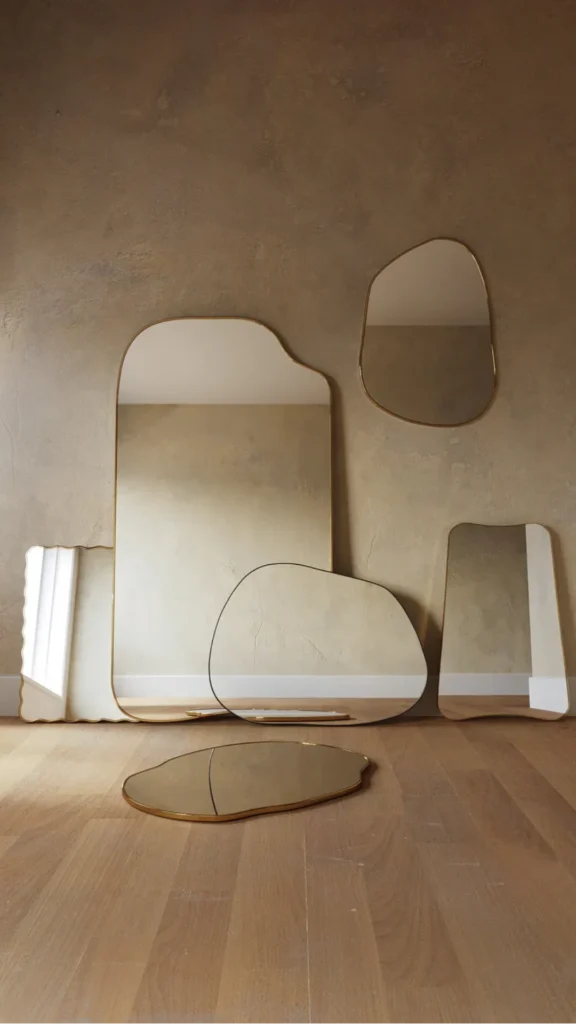 organic modern decor ideas organic shaped mirrors vertical surfaces arch round forms 2026