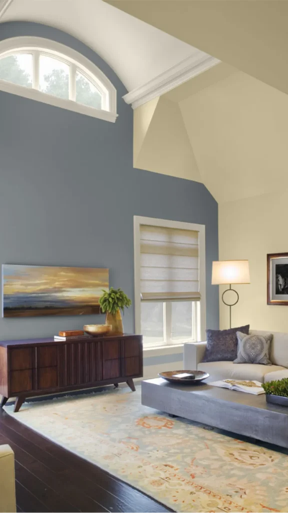 warm earthy paint colors living room large samples actual wall observed different light conditions 2026