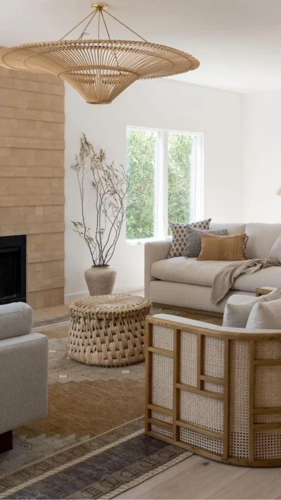 natural textures organic modern living room warm rattan pendant above linen sofa cushions 2026