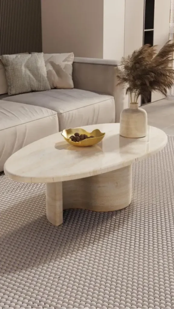 organic modern coffee table styling warm brass tray handmade ceramic dried grass travertine table 2026