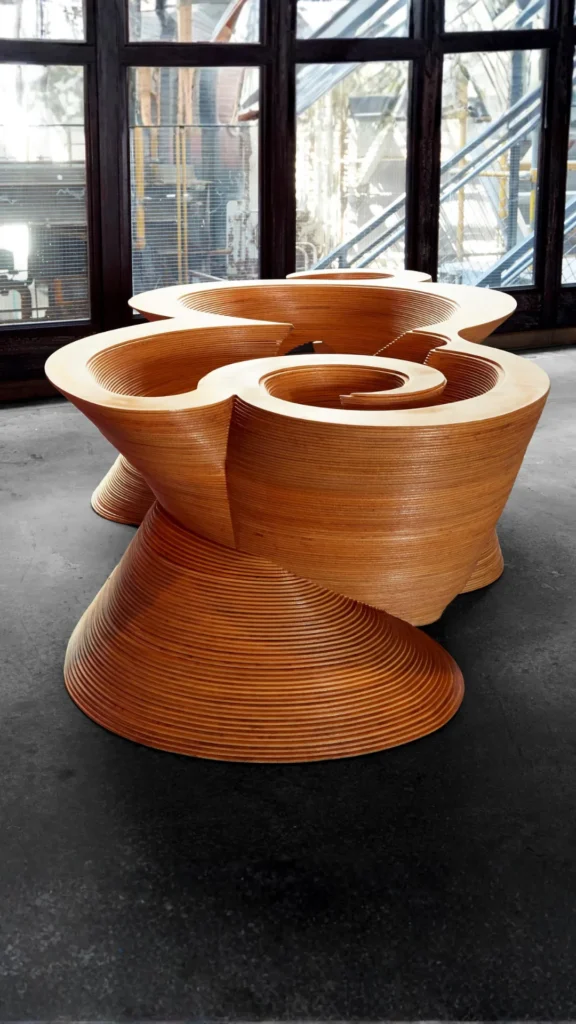 organic modern coffee table styling one sculptural stone object off-center warm wood table 2026
