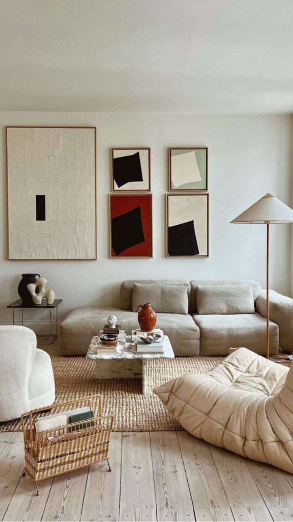 natural fiber rugs japandi living room cotton dhurrie warm white sandy stripes beneath arrangement 2026