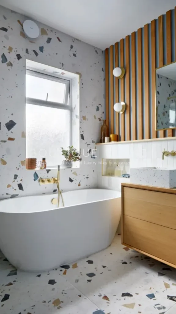bathroom tile ideas warm terrazzo sandy earthy tones warmth playful texture 2026