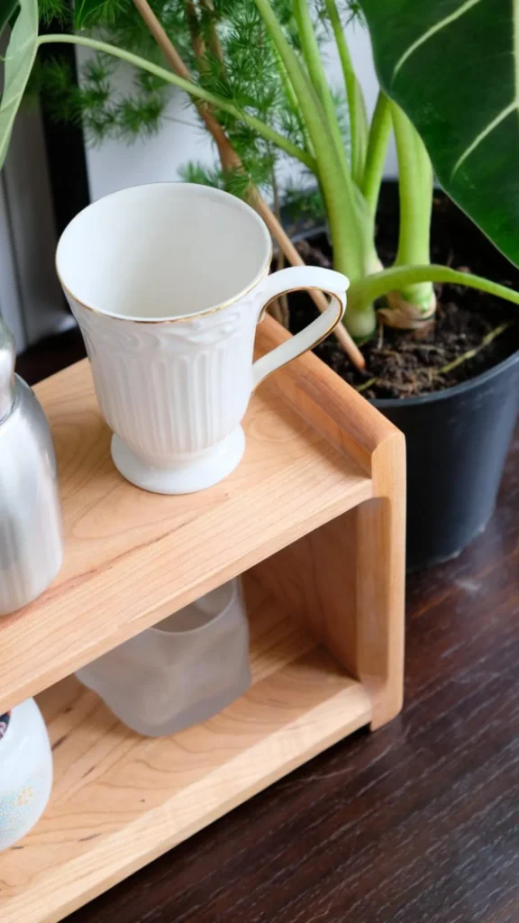 wabi-sabi objects organic modern home handmade ceramic mug thumb impression base warm wood shelf 2026