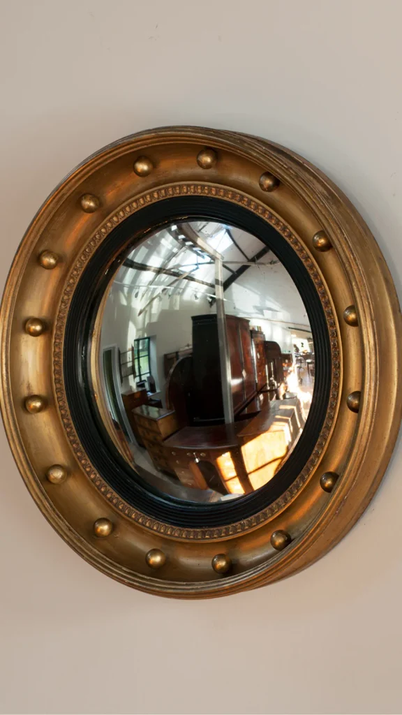 curved mirror ideas convex mirror brass sculptural accent 2026