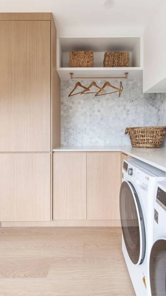 japandi laundry room ideas warm wood drying rack folding positioned 2026